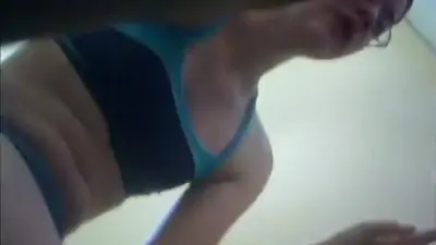 She wipes off and gets dressed