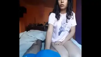 Fucks herself with dildo until she comes