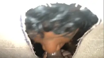 Husband and wife sharing cock in a glory hole